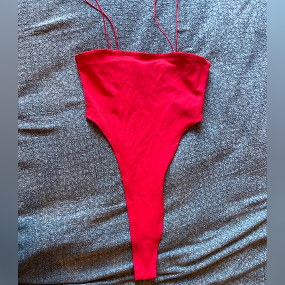 Red High-cut Camilla bodysuit from Edikted